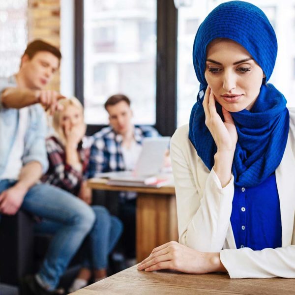 racially discriminated, muslim woman getting harassed at work