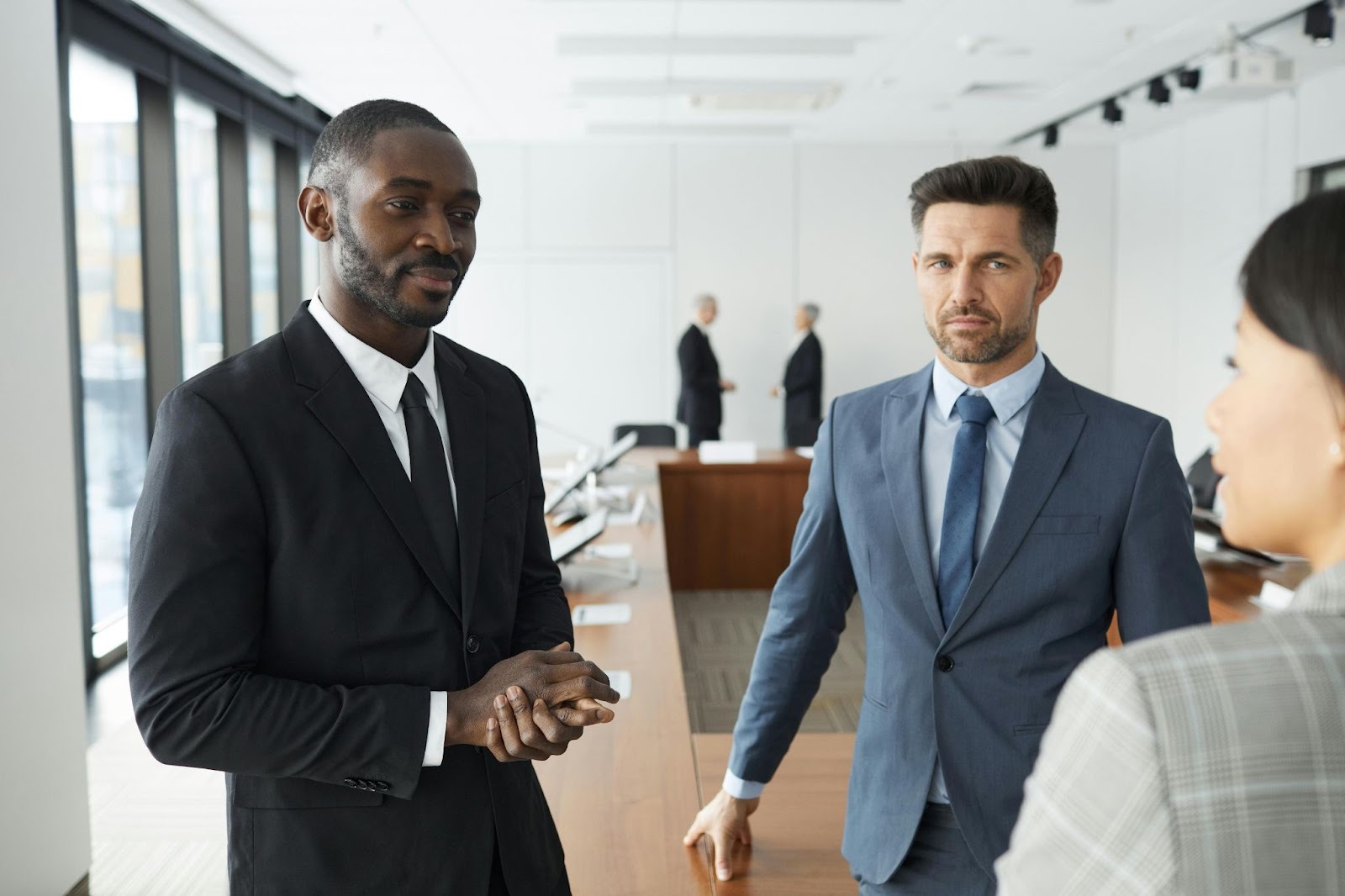 Workplace meeting where unequal treatment concerns may require a racial discrimination lawyer