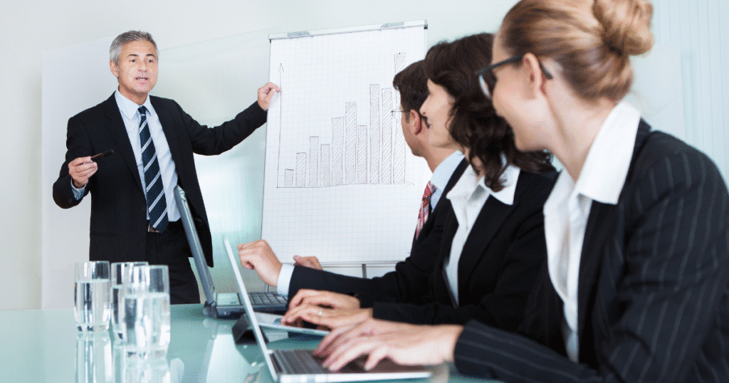 Employees attending a compliance training session on workplace education laws