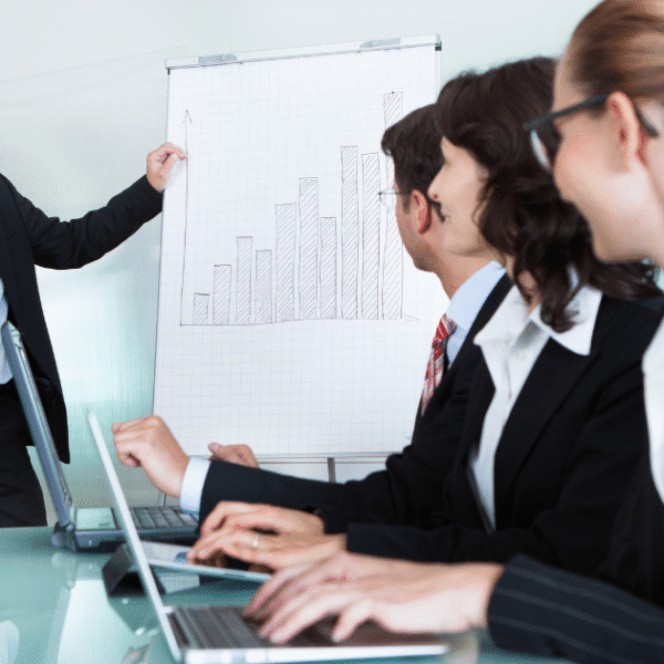Employees attending a compliance training session on workplace education laws