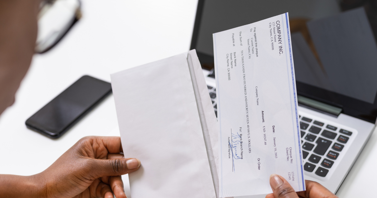Employee reviewing paycheck for errors after termination, checking for FLSA violations and unpaid overtime.