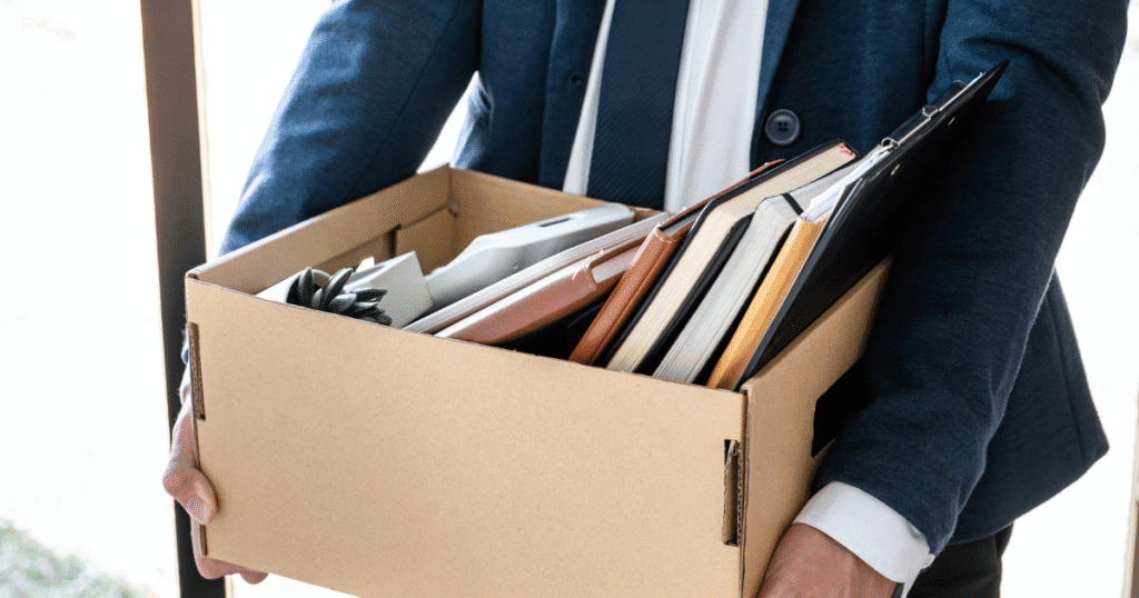 Employee facing termination meeting in Tennessee workplace, exploring wrongful termination without discrimination options